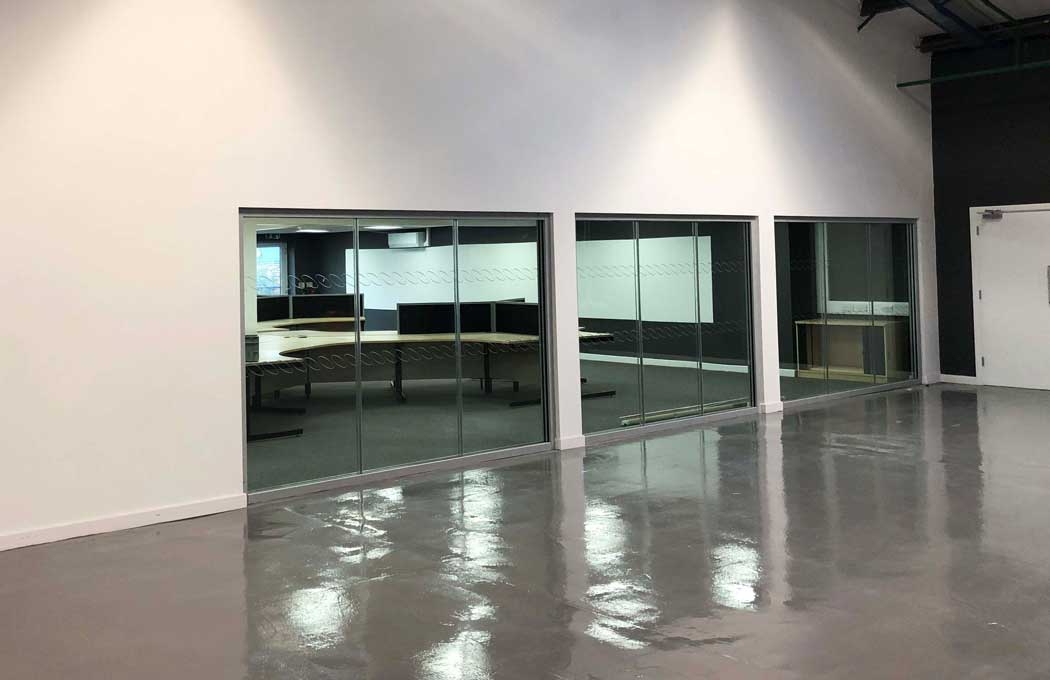 Slimming-World-Glass-Partitions-overseeing-the-warehouse-By-APSS